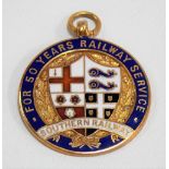 9ct hallmarked gold and enamel fob inscribed in coloured enamels 'FOR 50 YEARS RAILWAY SERVICE,