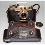 Leica replica military copy manual camera, inscribed Kriegsmarine no. 345458 and within leather case