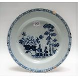 18th Century Delft blue and white dish, the centre foliate decorated, diameter 30cm.