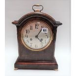 Oak cased bracket style two-train clock with 5.5in silvered dial and brass carrying handle, height