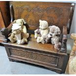 Early 20th Century oak monk's bench with lion carved arms, overall with carved decoration, width