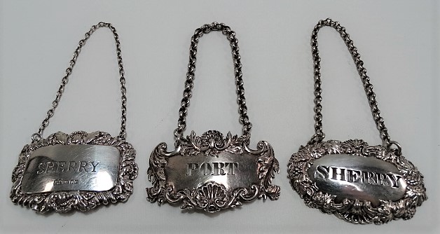 Two Victorian silver spirit labels, one 'PORT', maker TJ, London 1874, the other 'SHERRY', maker R.