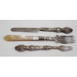 Early Victorian silver pickle fork foliate cast, pierced and engraved with mother of pearl handle,