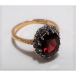 18ct gold diamond and garnet set cluster ring, weight 4.5g approx.