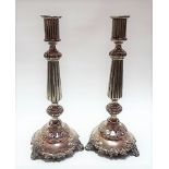 Pair of good Russian silver fluted and fruiting vine embossed baluster candlesticks, stamped