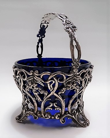 Good early Victorian silver swing handled sugar basket by James Charles Edington, of tapering