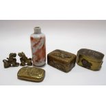 Two Japanese hinge lidded boxes with applied decoration together with a brass embossed Vesta case,