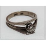 Modern 18ct white gold diamond solitaire ring, the brilliant cut stone of 0.25ct spread approx,