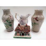 Two Japanese grey glazed earthenware vases with enamel decoration of birds amongst chrysanthemum,