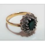 9ct gold diamond and emerald cluster ring, the oval emerald of 0.75ct spread approx, weight 3.3g