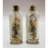 Pair of Chinese reverse painted rectangular section snuff bottles, both painted with mountainous