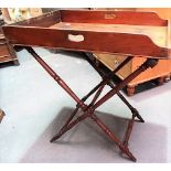 19th Century mahogany butler's tray upon folding stand with ring turned x frame supports, width