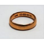 22ct hallmarked gold band ring, weight 5g approx