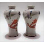 Pair of Chinese miniature carved porcelain famille rose vases, the body carved with stylised waves