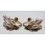 Pair of 18ct gold pearl set clip earrings, stamped K18, weight 3.9g approx