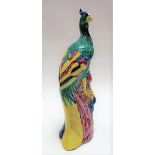 Chinese famille rose porcelain model of a phoenix bird upon naturalistic floral base, height 26cm (