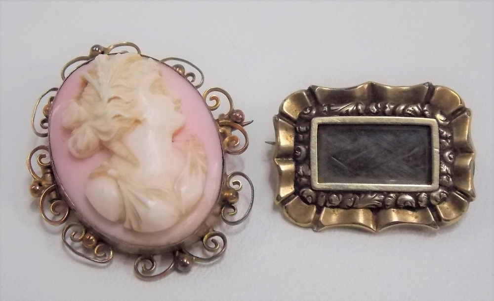 19th Century gold mourning brooch with glazed hair panel; together with a 9ct gold mounted cameo
