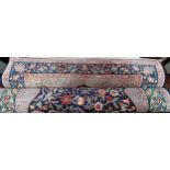 Modern Persian silk hand knotted rug with dark blue ground, width 109cm