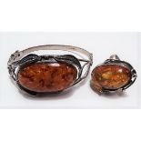 Modern silver hallmarked amber set bracelet together with matching amber set ring (2)