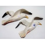 Pair of Beswick Pottery graduated seagull wall plaques no. 658-2 and 658-3.