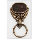 Good early 19th Century high purity gold swivel fob, with foliate embossed suspension ring and