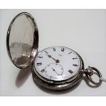 Silver full hunter key wind pocket watch, the enamel dial with Arabic Roman numerals and