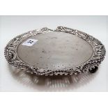 Victorian silver Neo Classical style card tray with pierced mask and harebell swag rim and raised on