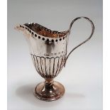 Victorian silver half fluted pedestal cream jug, maker H & T, Birmingham 1889, height 9cm, weight