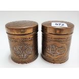 Pair of Islamic brass copper and silver inlaid cylindrical lidded boxes, height 9cm.