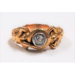 Exquisite high purity gold Art Nouveau diamond set ring, cast with two naiads and a serpent coiled
