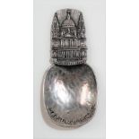 George V silver caddy spoon by Bernard Instone, with cast silver handle depicting St Paul's