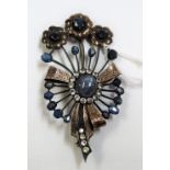 Antique gold & silver diamond & sapphire floral ribbon brooch, the central star cabochon sapphire of