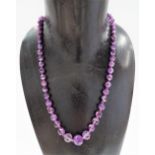 Amethyst faceted graduated bead necklace, length 52cm; together with a 9ct amethyst diamond chip