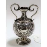 Miniature silver Greek styled twin handled pedestal urn, foliate scroll embossed, height 7cm, weight