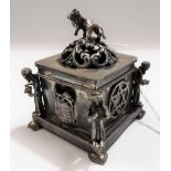 Jewish silver censer of square section, the domed C scroll pierced lid surmounted by a lion, each