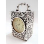 Victorian silver case travel clock by Mappin Brothers. 220 Regent Street, the case embossed with