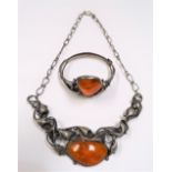 Modern Russian silver amber set pendant necklace, the irregular shaped amber encased by leaf
