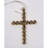Gold and diamond seventeen stone cross pendant, the diamonds of 0.05ct spread approx, weight 5.8g