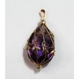 A 9ct gold and amethyst pendant with seed pearl drop, length 40mm approx.