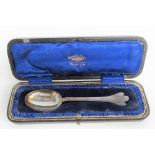 George V silver cased trifid and rat-tail Christening spoon, the finial engraved 'Henry', weight 0.