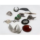 Quantity of silver & other costume jewellery brooches