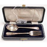 George V silver cased Christening fork and spoon, foliate engraved, maker MH & Co Ld, weight 1.