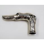 Continental Art Nouveau silver parasol handle in the form of a greyhound, stamped mark, length 8cm