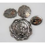Continental white metal brooch cast as a Viking in his ship with a surround of seagulls, width 58mm;