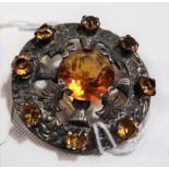 Scottish silver citrine set circular brooch, stamped SILVER, diameter 40mm