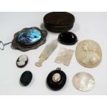 Two silver brooches, a hard stone pill box, shell cameos etc