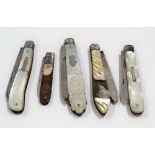 Collection of five silver bladed pocket knives with mother of pearl handles, including one by