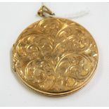 9ct hallmarked gold circular locket with leaf scroll engraved front, diameter 42mm, weight 16g