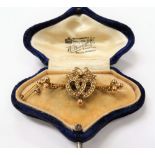 Attractive Victorian 15ct gold seed pearl set entwined hearts and ribbon knot bar brooch with safety