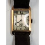 1930's 18ct gold cased manual-wind wristwatch, the square 22mm silvered dial with black Arabic